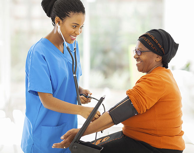 woman taking blood pressure