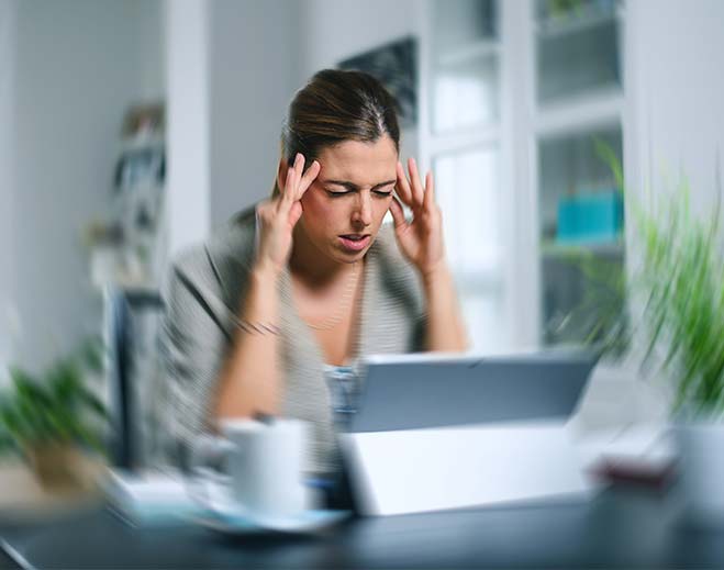 woman with her head spinning