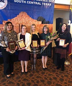 BHS nurses holding their plaques